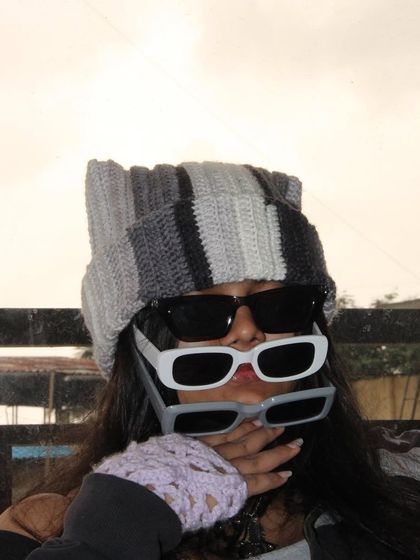 Having a little fun with my cat beanie and multiple pairs of sunglasses. Fashion is all about not taking yourself too seriously.