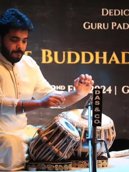 Preparing to play at the 'Sur Sadhana' concert. Tuning the tabla is a meditative process, a moment to connect with the instrument and the music of the masters.