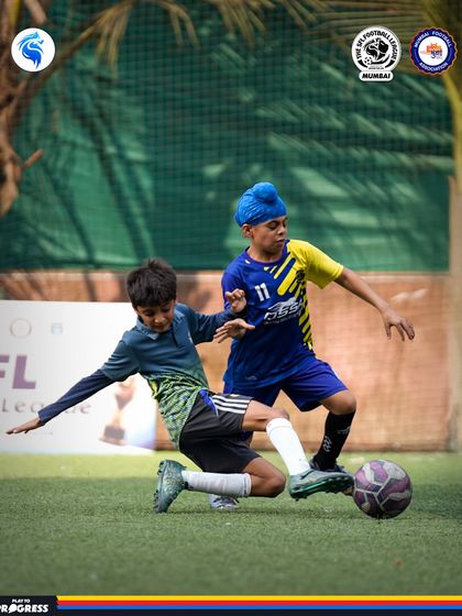 A perfectly timed slide tackle. We teach our players to be tough and decisive but always fair.