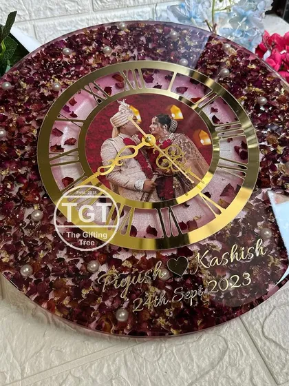 An angled view of the 16-inch clock, showing the depth of the resin and the vibrant colors of the preserved flowers.
