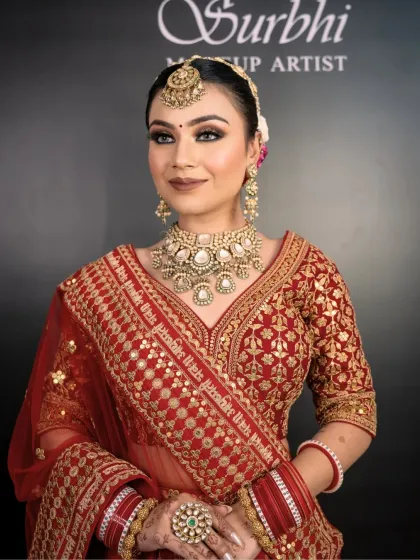 A beautiful portrait of the bride against my signature backdrop. Her makeup is a perfect example of blending tradition with modern techniques for a stunning result.
