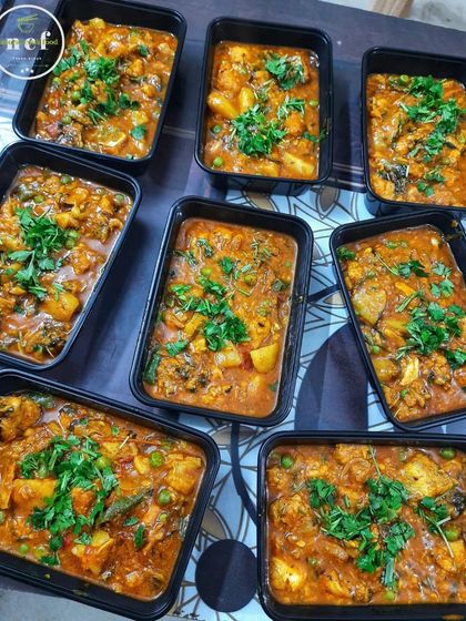 More boxes of our popular Sareng thongba, garnished with fresh coriander. We make this in large batches for festivals and special orders.