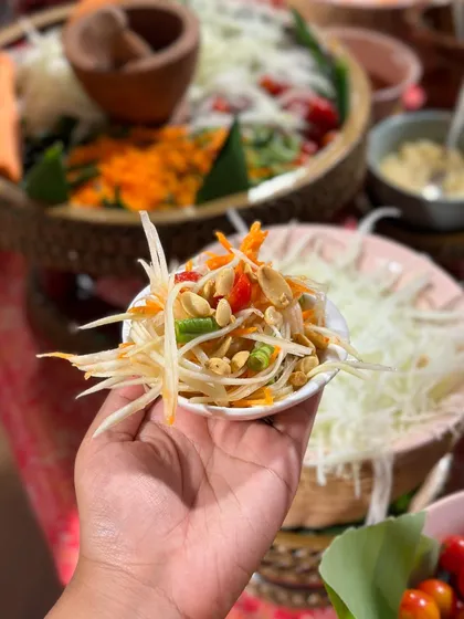 A fresh, vibrant Som Tam (Green Papaya Salad) from our live Thai station. The combination of sweet, sour, spicy, and salty flavours makes this a refreshing and addictive dish.