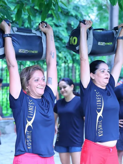 Strength comes in many forms, and here, it comes with a smile. My functional bootcamp sessions use equipment like sandbags to build real-world power. It's about becoming strong for life, not just for the gym.