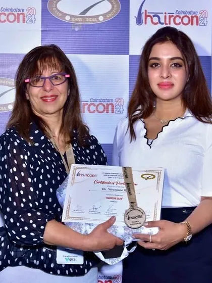 My commitment to advancing the field of dermatology is central to my practice. Here I am being recognized as a faculty member at Haircon 2024, the national conference for hair restoration surgeons. I believe in continuous learning and sharing knowledge to elevate the standards of patient care.
