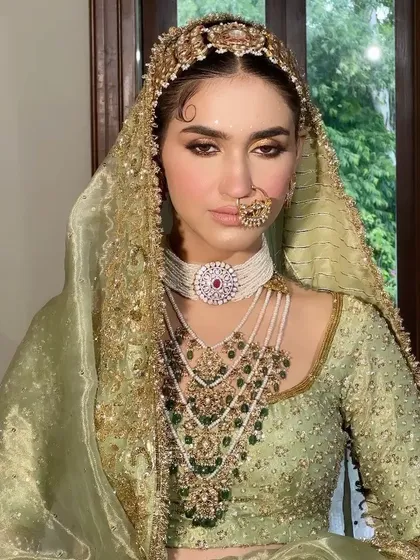 A close-up of the traditional bridal look taught in my masterclass, showcasing the intricate details of the eye makeup and the flawless base.