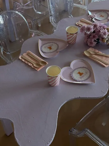 Another angle of the teddy bear tablescape, showing the striped paper cups and pink napkins that completed the look.