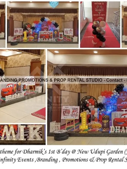 We brought the high-octane fun of Lightning McQueen to life for this first birthday at New Udupi Garden. The detailed setup includes character cutouts, a race-themed backdrop, balloon arrangements in the signature red, black, and yellow, and a custom "ONE" prop designed to look like a winner's trophy.
