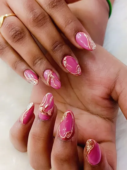 Wrapped in love and adorned in gold. This pink cat-eye set with sculpted gold accents and glitter is a beautiful choice for a bride who wants a touch of modern glam.