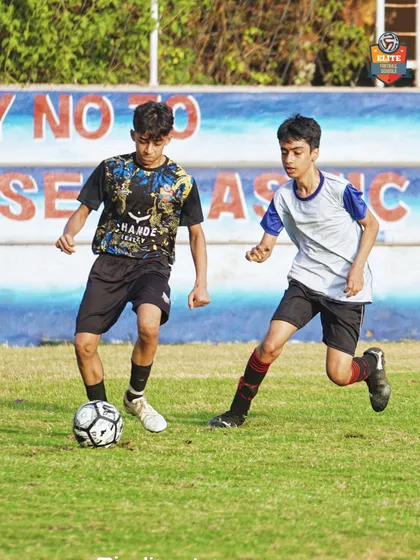 A player dribbling with skill and confidence during a competitive match in Goa.
