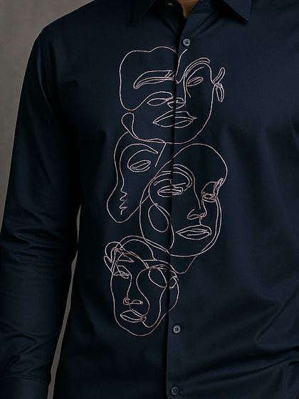 An angled close-up of the abstract faces, showing how the design wraps around the front of the shirt. This is a key detail in my bespoke shirtmaking process.