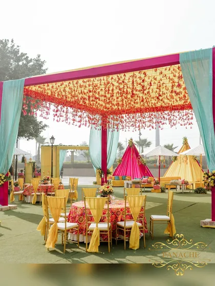 We believe in celebrations that are bursting with life and color. This poolside Haldi setup, with its vibrant canopies, traditional manji lounges, and phulkari details, shows how we infuse energy and joy into pre-wedding festivities.