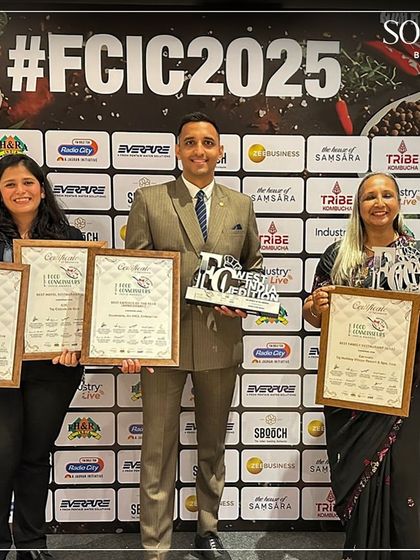 Our team proudly displaying multiple awards and certificates at the Food Connoisseurs India Convention 2025. A testament to our team's hard work and dedication.
