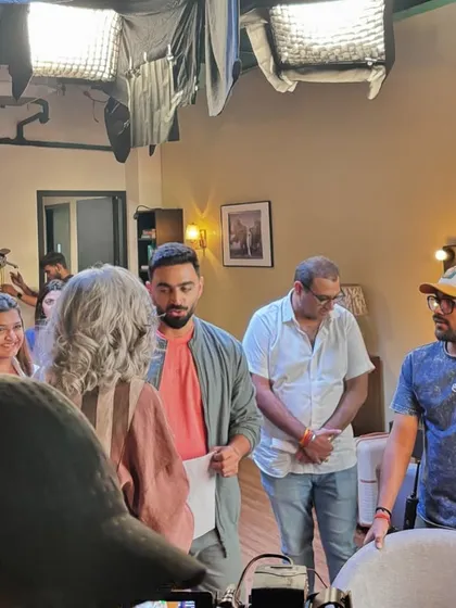 On set with the team and Madame Z, briefing her for the next shot. Collaboration and clear communication are key to a successful production.