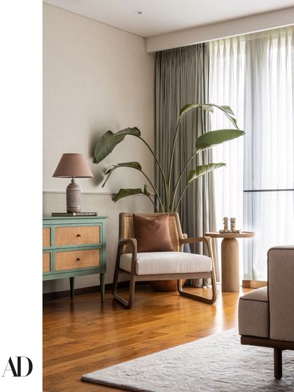 A quiet corner from The Collector's Retreat, featured in Architectural Digest, showcasing our use of natural light and curated furniture.