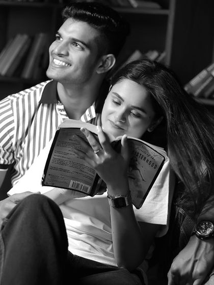 A classic black and white portrait of a couple in our library set, creating a timeless and romantic memory.