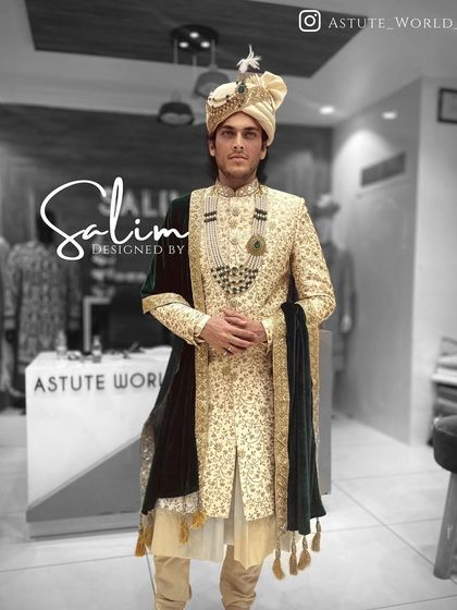 A sophisticated wedding look featuring a gold-beige sherwani with all-over embroidery. I styled this with a contrasting dark green velvet stole to add depth and richness to the overall outfit.