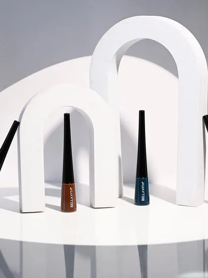 A creative and artistic product shot using architectural props. This type of conceptual photography tells a story and creates an emotional connection, elevating the product beyond a simple e-commerce image.