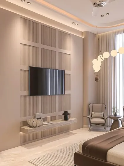 A cozy bedroom featuring limewash walls, a paneled TV unit with integrated shelving, and a modern bubble chandelier. The soft, warm textures and neutral tones create a serene and timeless space.