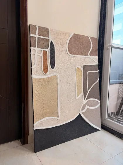 A 4ft x 3ft custom abstract painting with heavy texture, made for a residence in Kolkata. The earthy tones and bold white lines create a striking visual contrast.