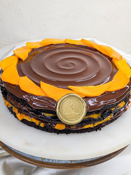 For those who can't decide between chocolate and mango, we have the Nutella Mango Cake. Fresh mango is mixed into Nutella and layered with our chocolate sponge.