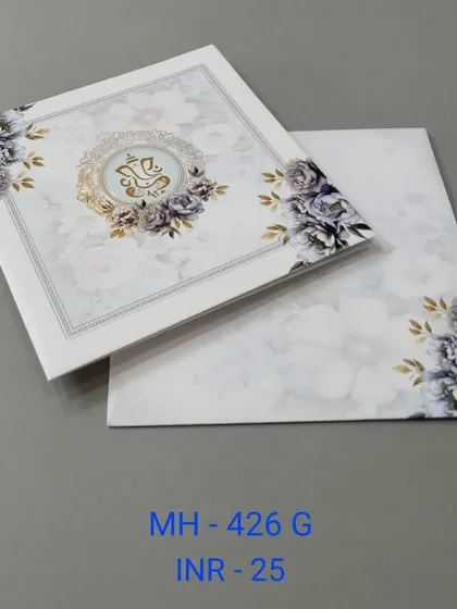 A beautiful and affordable invitation with a floral background and a central Ganesha emblem. The purple and gold color combination is both royal and serene.