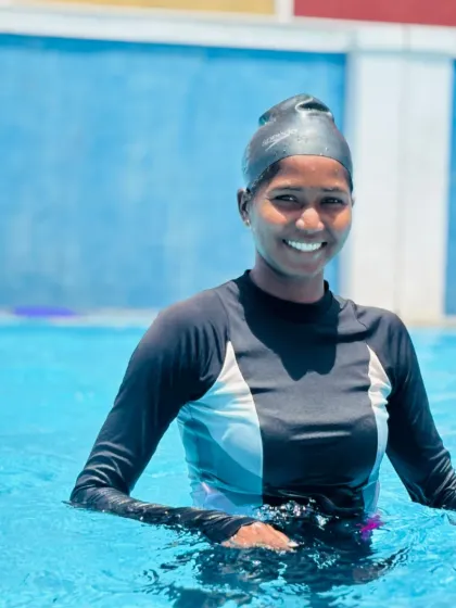 It's never too late to learn. This smiling swimmer is part of our adult and teen program, where we provide a comfortable and encouraging environment for learners of all ages to build their skills.