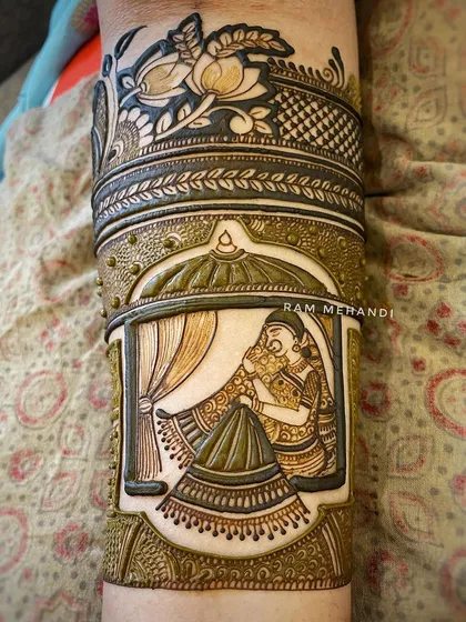 A close-up of a bride in a jharokha, created with a special technique to give it a 3D, embossed look. This makes the central figure pop and adds a unique texture to the design.