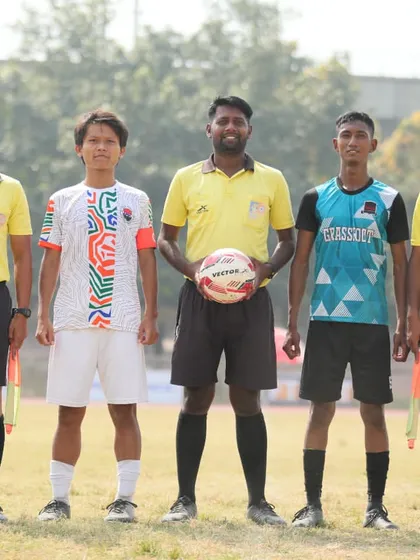 The pre-match formalities with captains and referees for the U19 game.