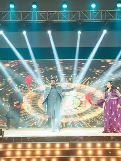 The groom takes center stage with his own choreographed performance, a highlight of the sangeet night. We help plan these special surprises.
