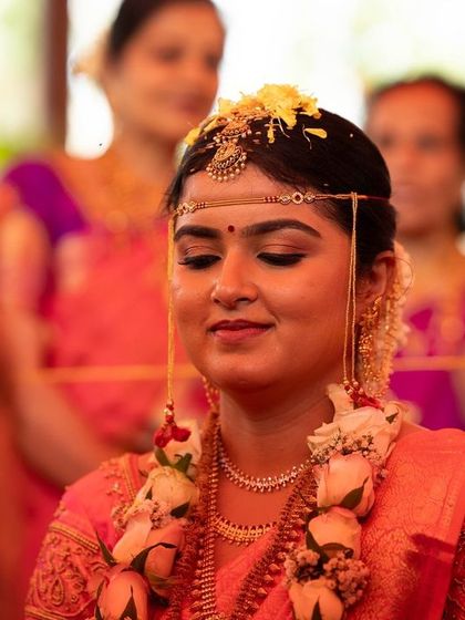 A candid moment during the wedding ceremony. The bride's makeup remains flawless even in close-up shots, highlighting the quality and longevity of the products I use.
