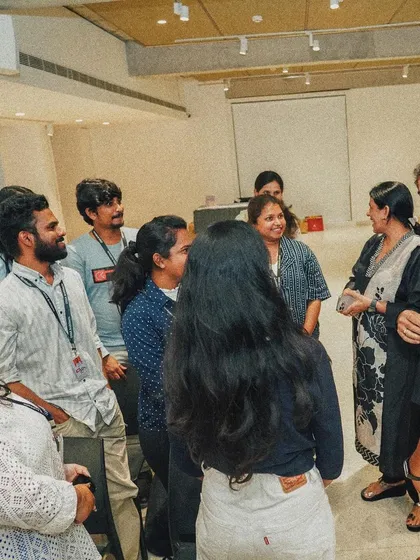 Our team members interacting with guests, sharing the stories and projects featured in the book.