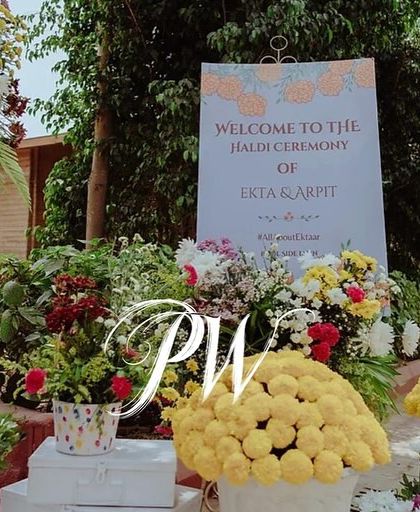 A peppy and floral welcome sign for a Haldi ceremony, setting a cheerful and inviting tone.