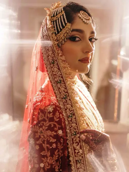 A bridal portrait is more than a photograph; it's a timeless piece of art. We use light and shadow to create a sense of drama and elegance, ensuring the bride's grace and personality shine through in a truly regal portrait.