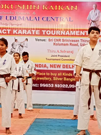 My brown belt students are ready for their group kata performance. Their synchronization has to be perfect.