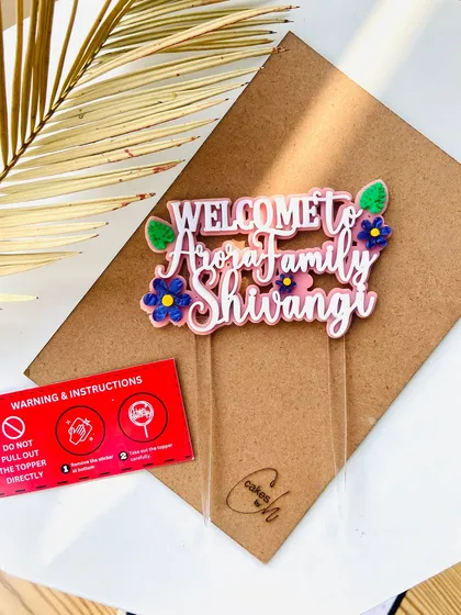 I love bringing colorful ideas to life! This "Welcome to the Arora Family" topper uses multiple acrylic colors and floral details to create a vibrant and heartwarming piece for welcoming a new bride.