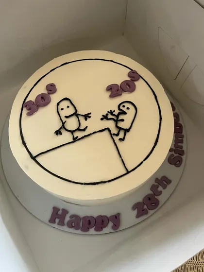 Another look at our popular "20s vs 30s" doodle cake, a fun way to mark a birthday with a relatable joke. The flavor inside is our Chocolate & Salted Caramel with Praline crunch.