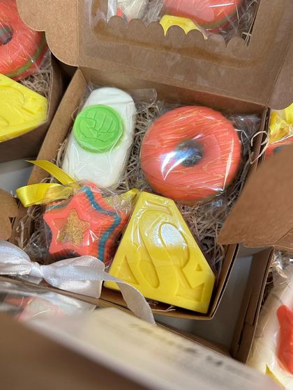 Another variation of our popular superhero theme, this box includes a Hulk popsicle soap, a Superman logo soap, a star popsicle, and a donut soap.