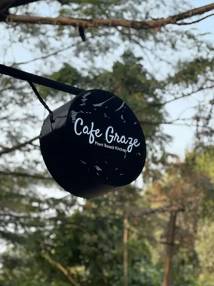 The Cafe Graze sign, a beacon for those seeking healthy, plant-based food.
