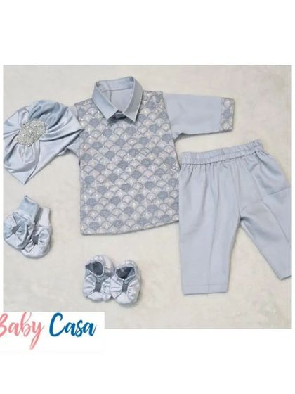 A stylish grey ethnic set for a little boy, complete with a printed vest, matching shoes, and a satin turban. A modern and comfortable choice for festive celebrations.