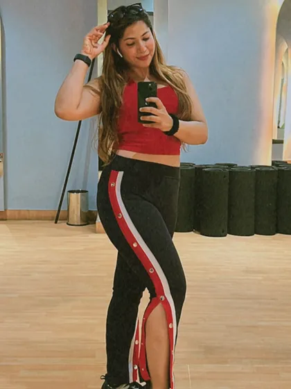 A confident pose after a workout. Every session is a step towards becoming a stronger version of yourself.