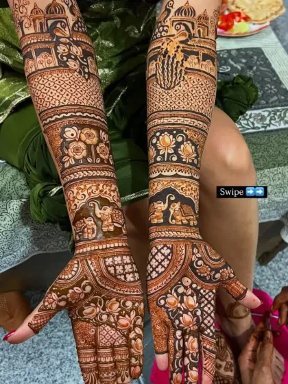 A beautiful full-arm design with a mix of floral bands, jaal work, and elephant figures.