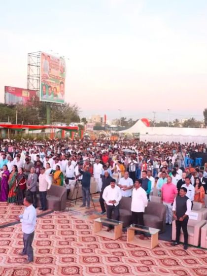 A massive crowd gathered for the Bharat Mata event. We provide the necessary infrastructure, including ground cover and seating, to manage large audiences in open-field venues.