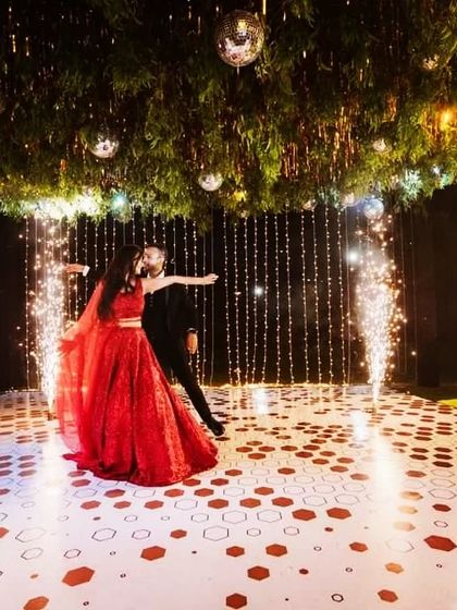 A stunning shot of the couple's dance with cold fireworks. These special effects create a truly grand and memorable finale.