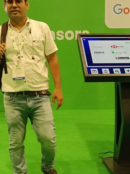 Standing next to an interactive display at the convention. I am always on the lookout for new performance marketing tools and analytics platforms that can provide better data and results for businesses.