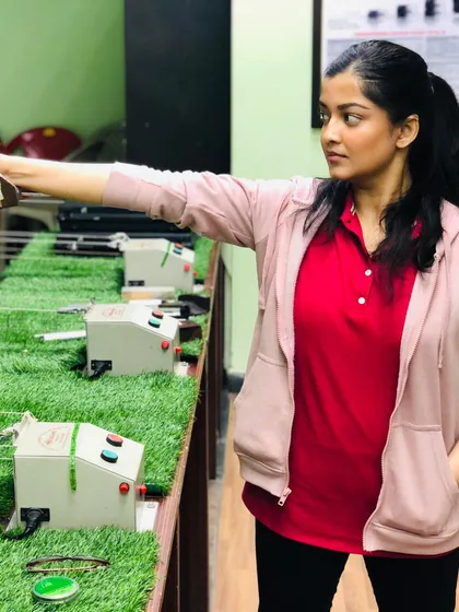 A shooter demonstrates excellent form and focus at our academy. Whether you are a beginner or have some experience, we provide the guidance to help you improve.