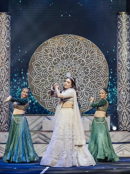The determination and grace of a bride ready to shine. This is a glimpse of a stunning bridal solo, complete with professional backup dancers that amplified her show-stopper performance.