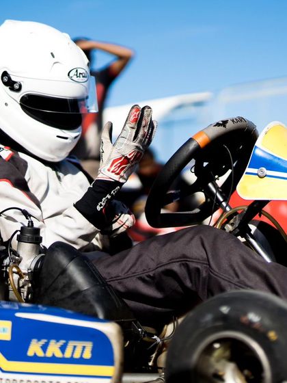 A duplicate shot of a driver in his kart.