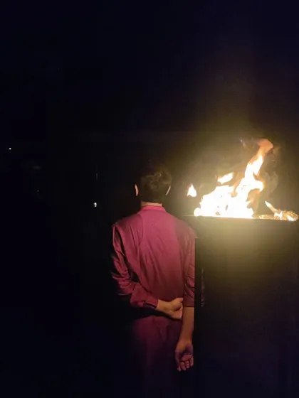 Standing by the sacred fire during the Linga Bhairavi Yantra Ceremony. The fire element purifies and energizes the space and everyone present.