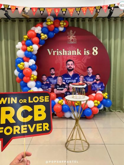 An RCB-themed birthday party for a little cricket fan! We can customize the decor to match any passion or interest.